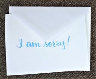 An apology letter feature photo envelope